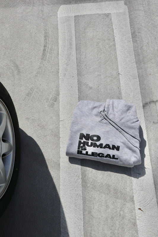 "No Human Is Illegal" Hoodie in Grey Chia